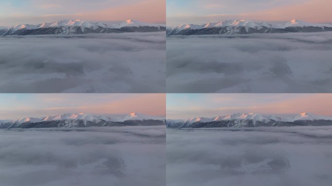航拍冬季清晨的新疆喀纳斯雪景和日照金山