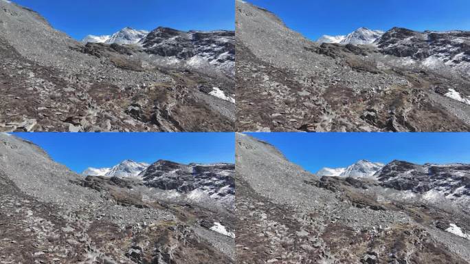 四川阿坝航拍攀登岷山山脉四根香峰的登山者