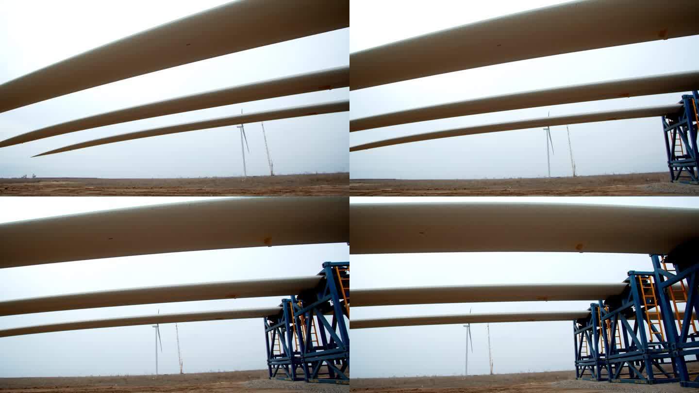 从支撑结构上的风力涡轮机叶片下的全景，4k