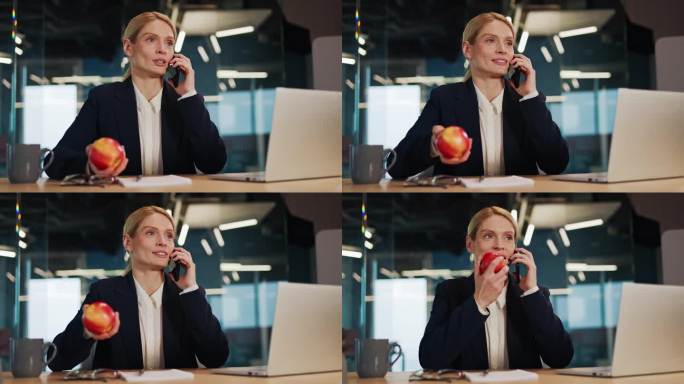 自信，成功的女商人在电话中与拿着红苹果的客户交谈。商务女性在午餐休息时间在时尚、现代的办公室里工作。
