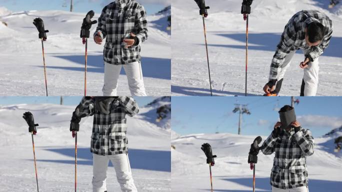成年男子准备在雪山上滑雪