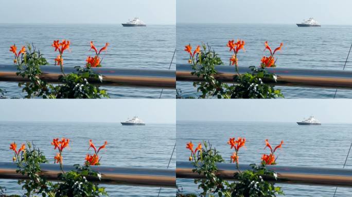 摩纳哥，落寞的巨型游艇穿过夕阳下海上的橙色花朵，巨大的摩托艇，亿万富翁的财富生活