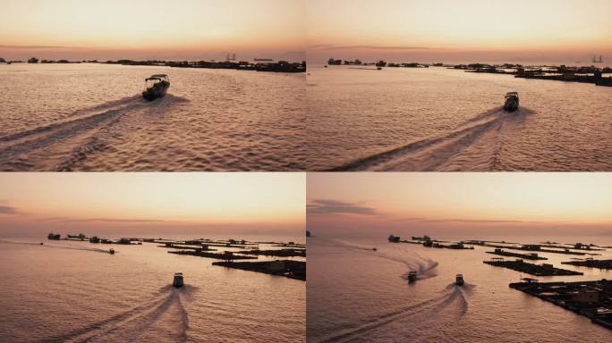阳江海陵岛海上牧场渔排夕阳渔船出海