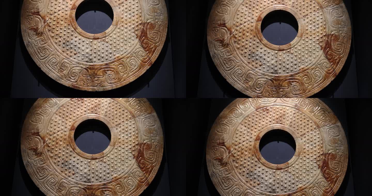 西汉双身兽面纹玉璧，陕西考古研究院藏