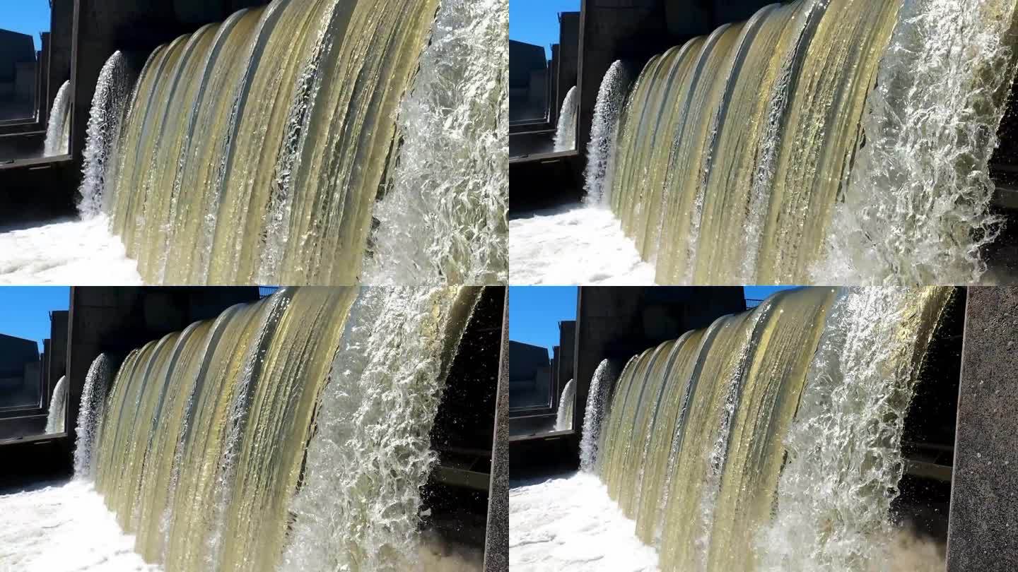 一个阳光明媚的日子里，多瑙河上一座水电站的排水闸门的特写镜头