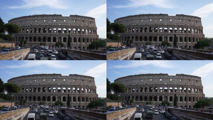 意大利罗马- 2023年9月3日。罗马帝国大道上的人和汽车交通，背景是罗马斗兽场
