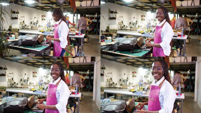 年轻女裁缝黑人，在皮具厂工作