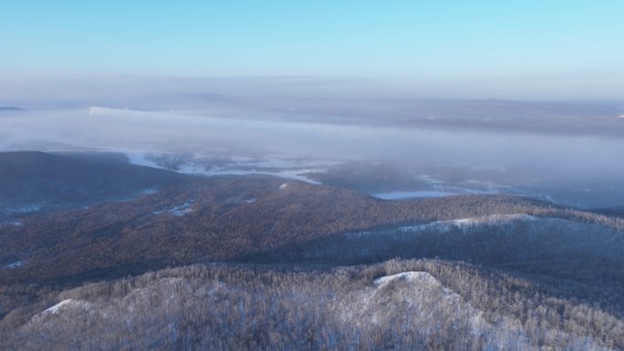 延时航拍寒冬林海雪原冻雾