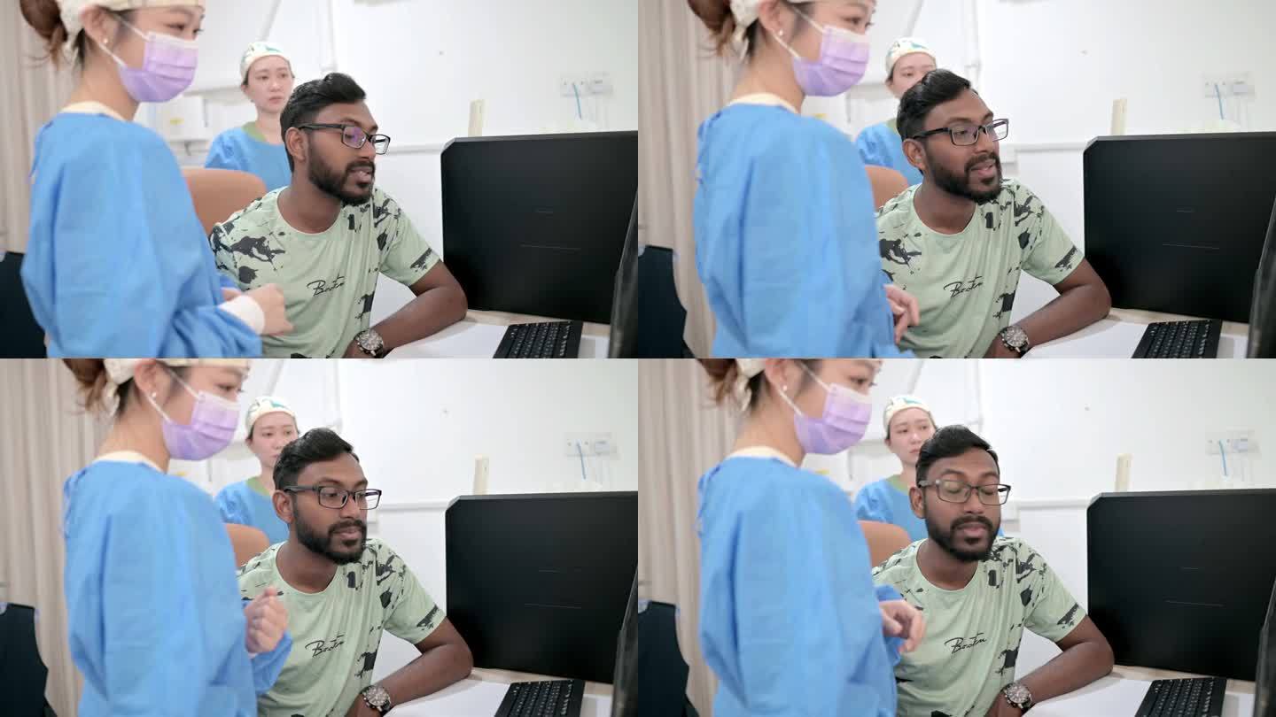 亚裔华裔女牙科医生向病人解释x光检查。