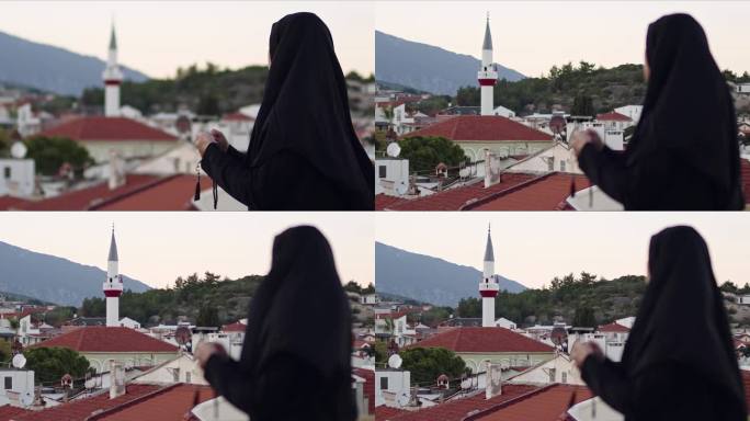 穿着黑色祈祷服和清真寺的穆斯林盲人年轻女子