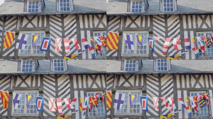 各国国旗在一座法国古建筑后面随风飘扬。高品质4k画面