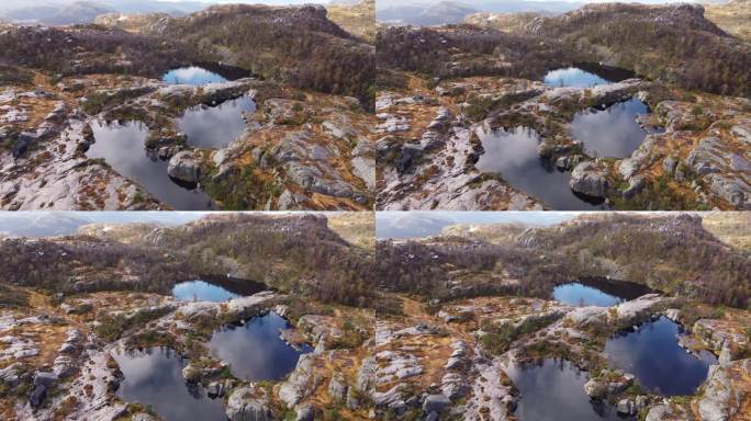 挪威布道石(讲坛岩)徒步旅行路线上的小山湖的无人机镜头
