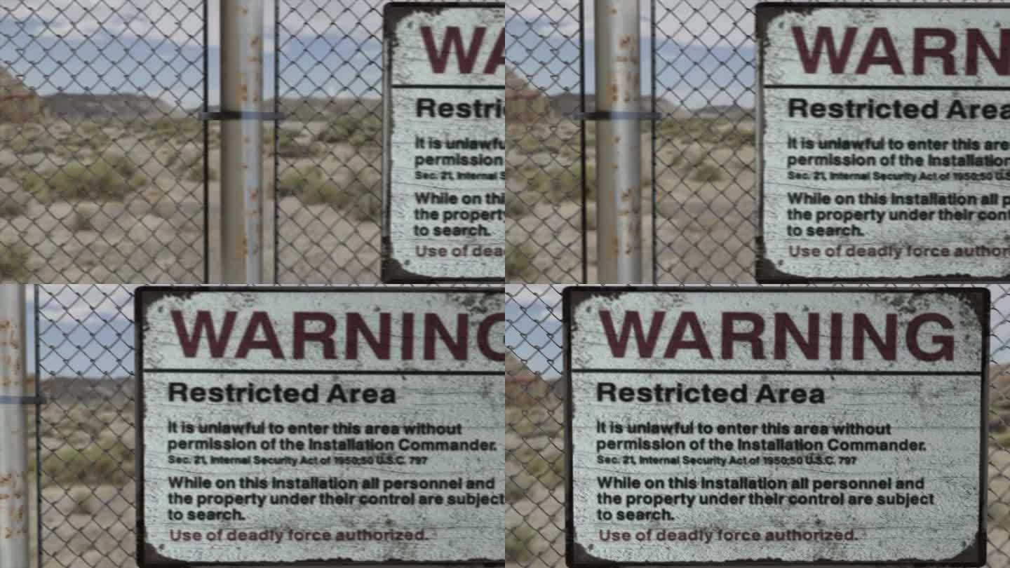 高质量的3D CGI渲染在一个高安全设施在沙漠场景中的链式围栏，与一个警告禁区标志