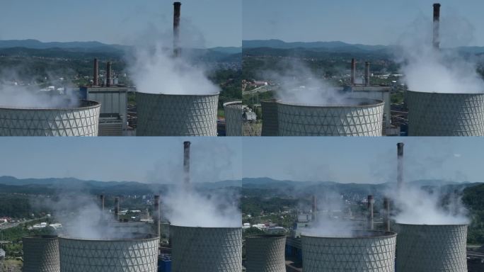 电厂烟囱鸟瞰图，工业区。烟囱冒烟的特写