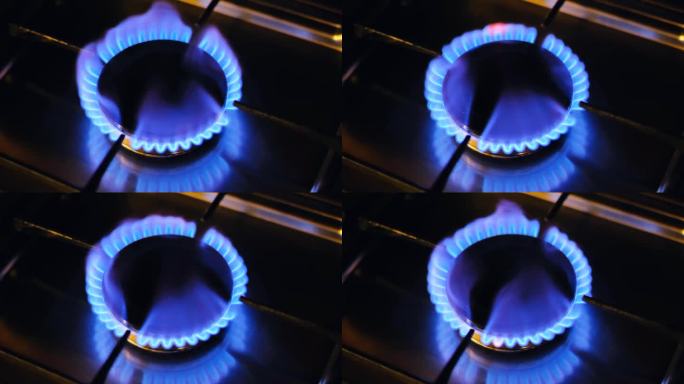 天然气燃烧。煤气燃烧器和蓝色火焰。住户气体消耗量。天然气短缺和购买。气体储蓄。