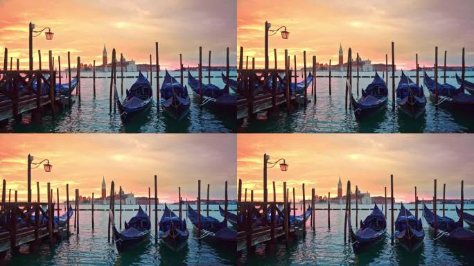 在威尼斯柔和的粉黄色日出中，通过摇曳的贡多拉和灯笼站在泻湖蔚蓝的水中，俯瞰圣乔治马焦雷