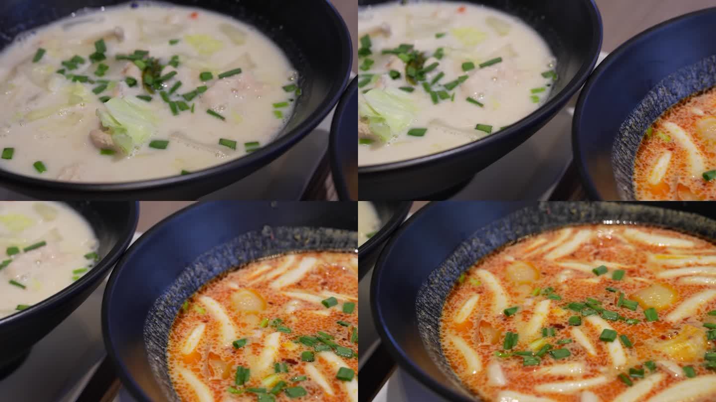 特写盘子里有泰国汤，鸡肉汤和海鲜汤。