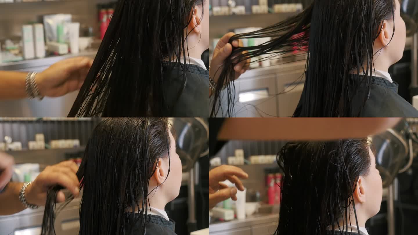 发型师正在为沙龙里的女孩梳理又湿又黑的头发。造型师正在进行培训。