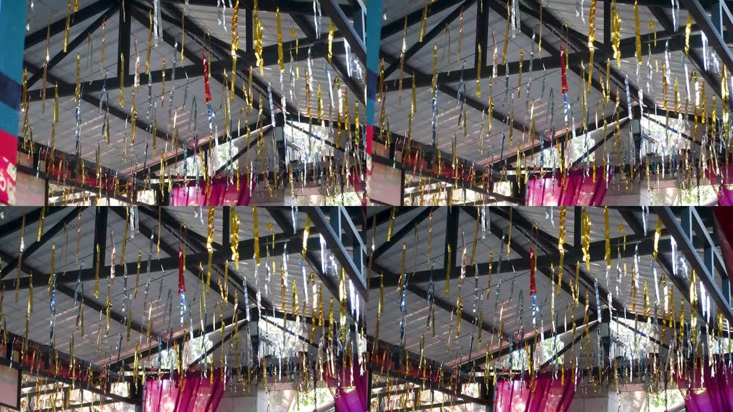 庆典的辉煌:印度北阿坎德邦德拉敦市节日期间悬挂的彩色玻璃纸-传统媒体描绘传统仪式和节日欢乐