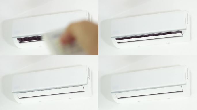 模糊的手特写用客厅内的遥控器关掉墙上的白色空调。引起普通感冒疾病和流感疾病