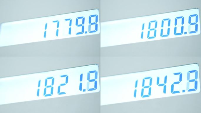 放大，加油站燃油价格上涨显示。