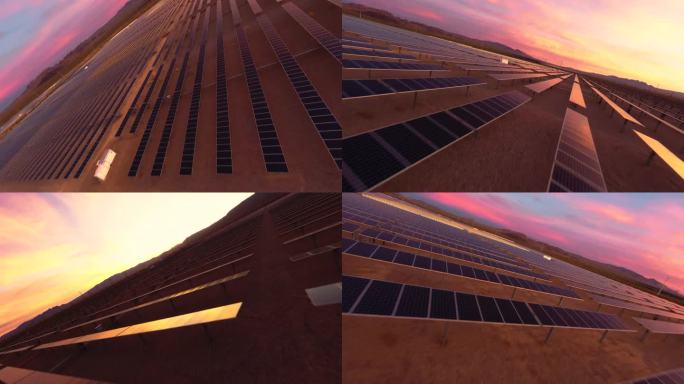 在黎明或黄昏的黄金时段，FPV无人机在沙漠中飞过太阳能农场