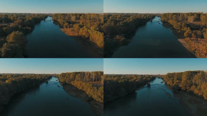在黄金时段，无人机拍摄的马里察河在保加利亚哈斯科沃的季米特洛夫格勒镇流动