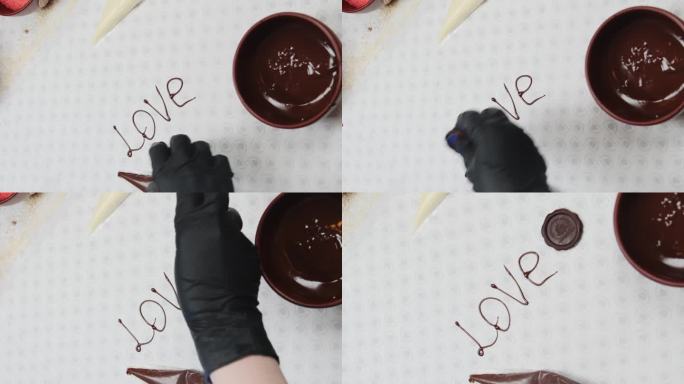 厨师写完题词，把巧克力邮票放在字旁边