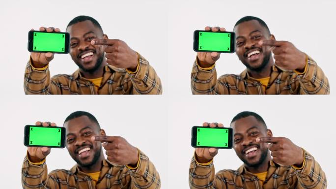 快乐的黑人，为社交媒体广告或网络品牌指点手机绿屏。白色背景，展示或微笑的人的脸，移动应用程序的色度键