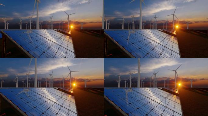 美丽的日落伴随着旋转的风力涡轮机和太阳能电池板