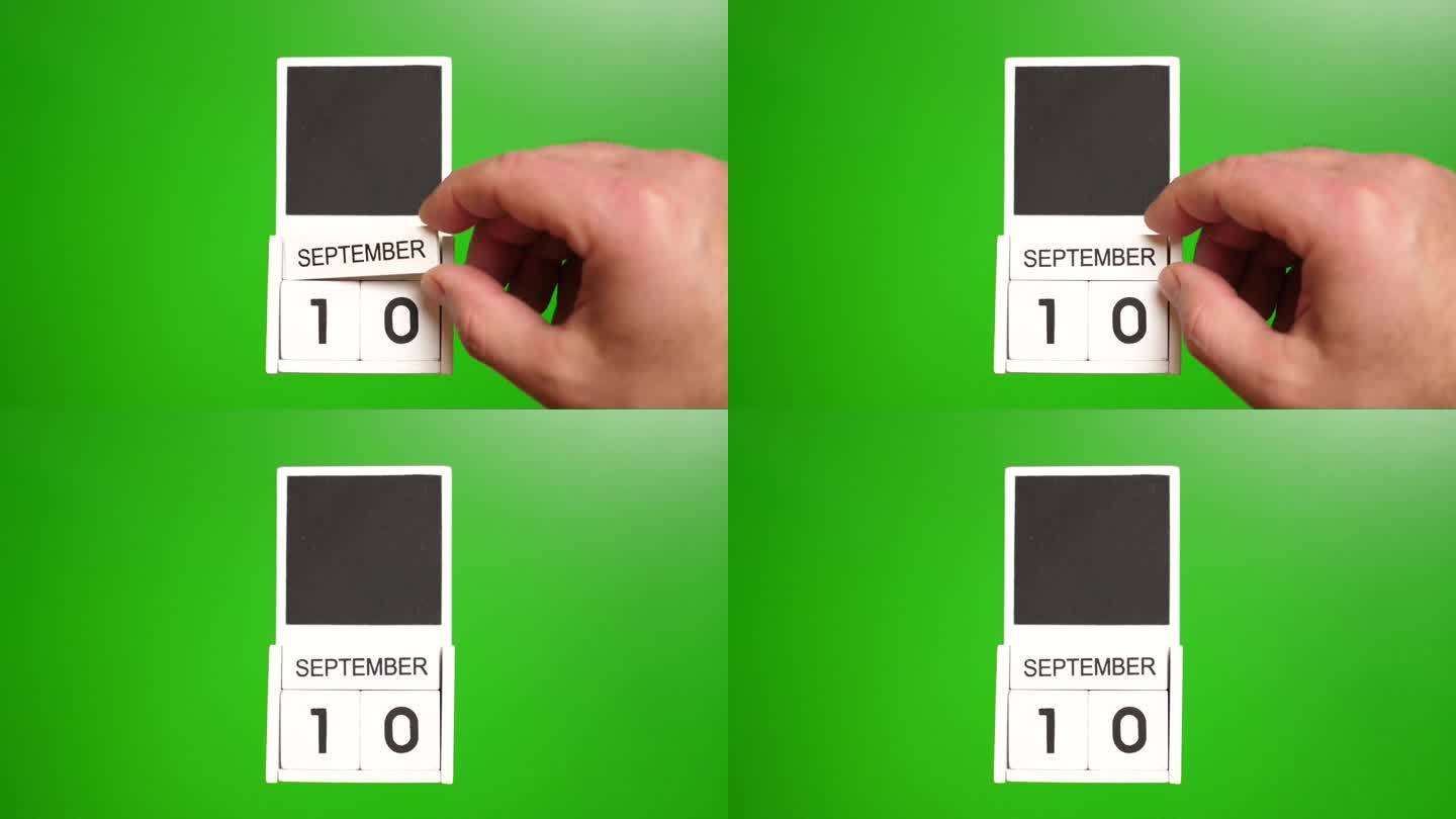 日期为9月10日的绿色背景日历。说明某一特定日期的事件。
