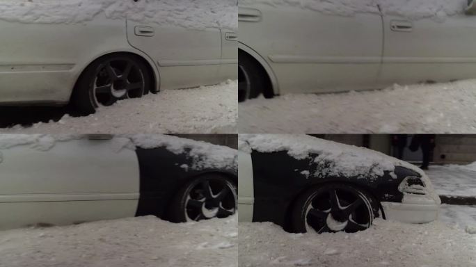 一场冬季暴风雪中，道路附近的车辆被雪淹没