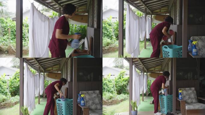 欧亚裔女护士在家里用去污剂洗脏衣服