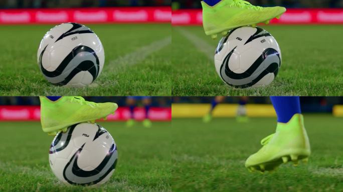 在足球游戏中，玩家把足球放在草地上，把脚放在足球上面，然后踢足球