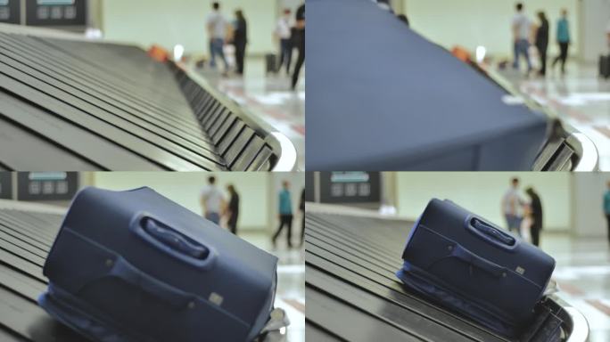 白天，旅客在机场附近等候时，行李在自动行李提取机上移动