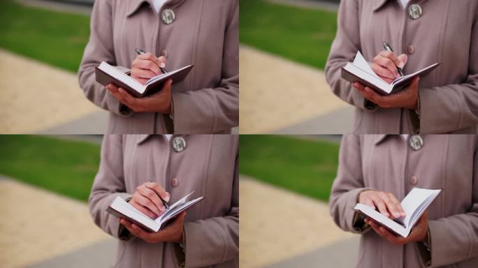 一位身着职业装、拿着记事本的非裔美国女性在城市背景下接受采访。