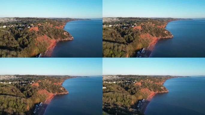 巴巴科姆，托贝，南德文郡，英格兰:鸟瞰图:红色砂岩悬崖，Oddicombe海滩和巴巴科姆丘陵在一个阳