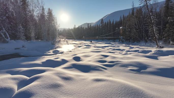 阿勒泰禾木冬季冰雪河流瀑布航拍自然风景