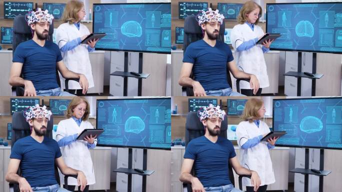 女神经科医生从脑电波扫描耳机中读取数据