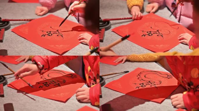 小朋友写下“画龙福”福字，恭贺新年