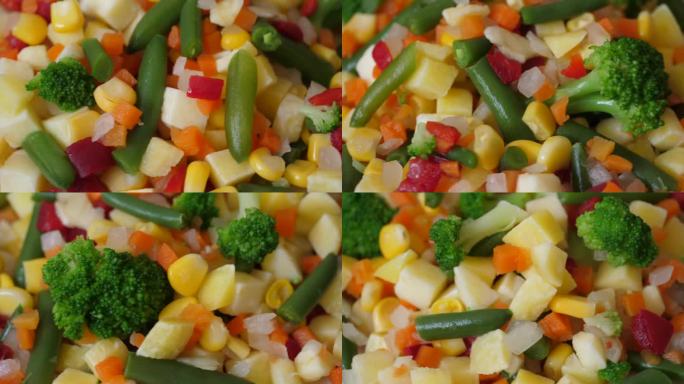 新鲜混合蔬菜青豆玉米花椰菜红辣椒胡萝卜近距离。微距拍摄混合蔬菜背景。特写健康清洁饮食，有机饮食素食素