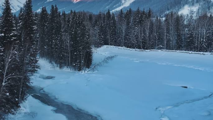 阿勒泰禾木冬季冰雪河流瀑布航拍自然风景