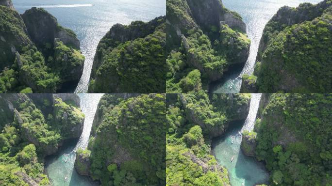 王龙湾的披披岛隐藏在高耸的悬崖峭壁之中，蔚为壮观