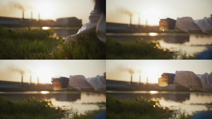 生态学家穿着化学防护服检查水质，收集水质污染检查样本