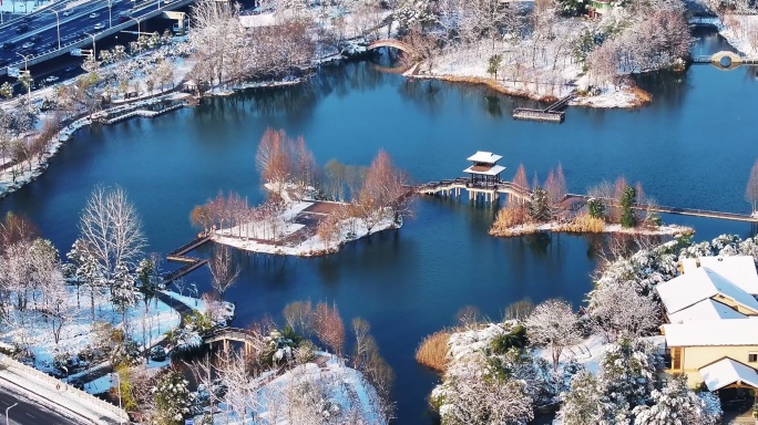 4k长沙洋湖湿地公园雪景航拍