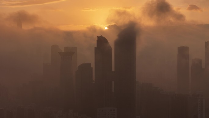 航拍深圳云海上的城市日出风光宣传片空镜