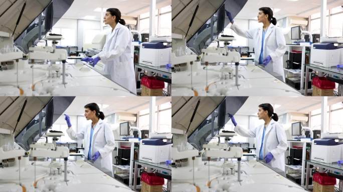 拉丁美洲女医生在实验室分析血液样本