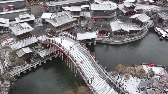 航拍襄阳唐城景区冬天雪景城市建筑旅游风光