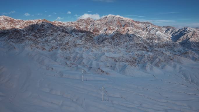 新疆伊犁冬季雪山光影航拍延时