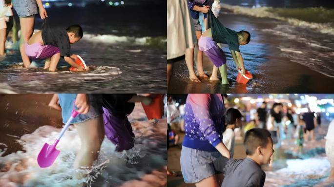 一对母子夜晚在海边沙滩踏浪玩水